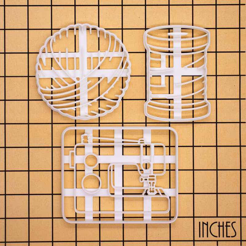 set of 3 cookie cutters - sewing machine, spool of thread, and yarn ball